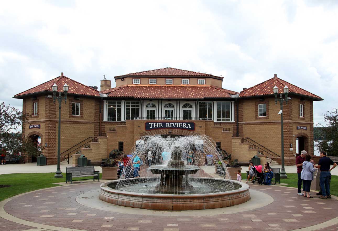 The Riviera Ballroom, brick building with white windows and water fountain in front.