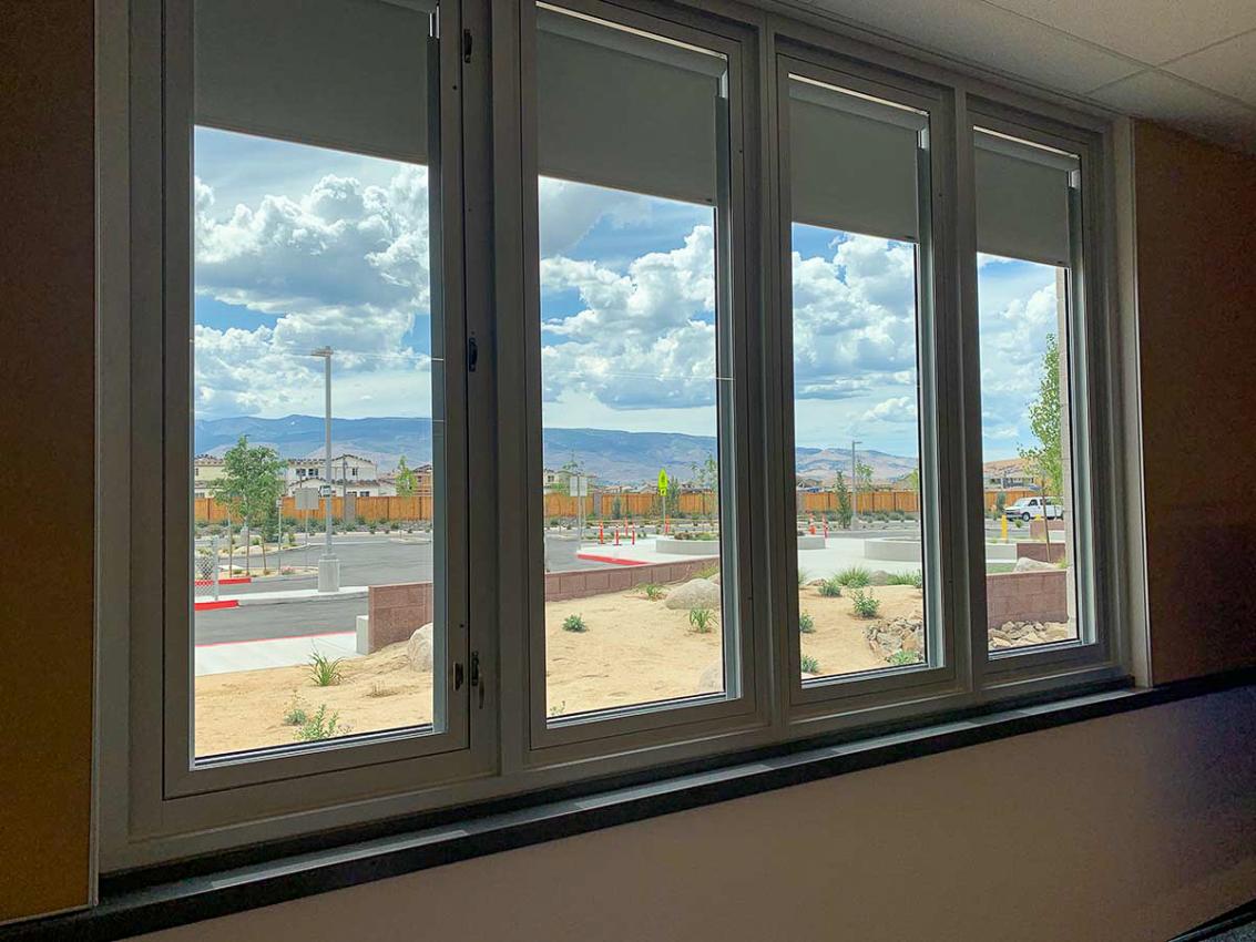 Students in the Washoe County School district in Reno, Nevada benefit from the abundant natural light conditions in multiple ways. The automated Transira shading system controls light and significantly improves occupant comfort. Pathogens in the space are reduced because the shade is encased in between glass.