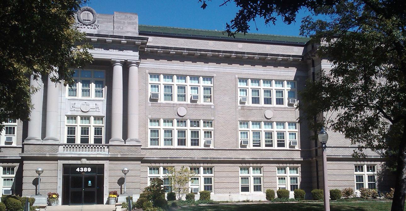 Rosati Kain uses WINCO's 4410S single hung windows with custom panning, snap trim, and a crisp painted Kynar finish to match the original wood frame windows.