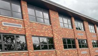 Brick building with Dark Bronze Anodized windows
